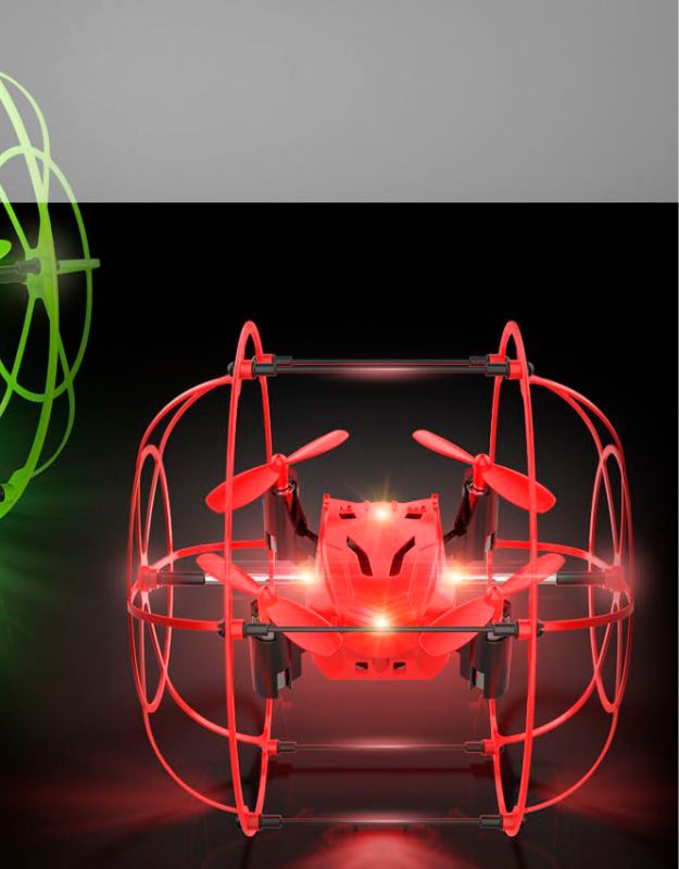 Red mini drone with protective cage and glowing LED lights in flight.