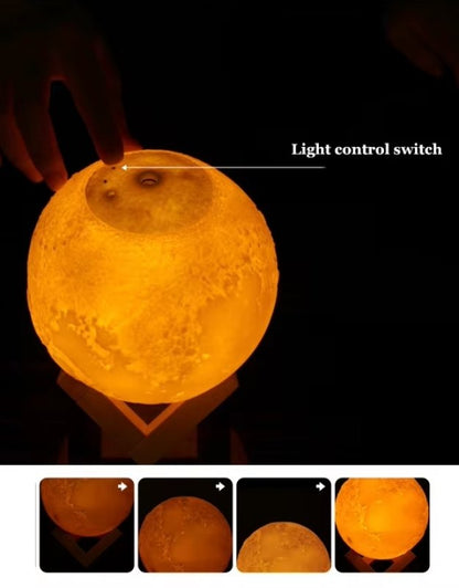 Close-up of glowing moon lamp humidifier showing light control switch on top.