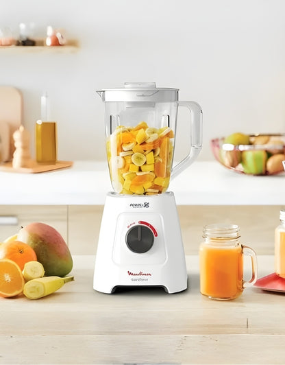 Moulinex Blend Force 2L Blender 600W with tropical fruits and fresh juice on kitchen counter
