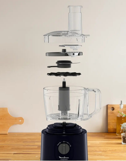 Exploded view of Moulinex Easy Force food processor showing detachable lid, blades, discs, and mixing bowl assembly.