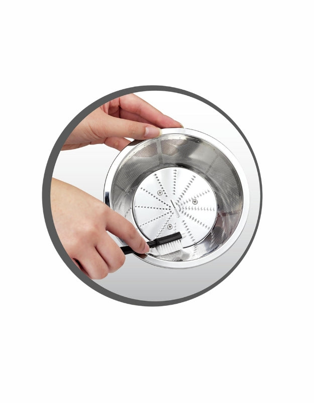 Moulinex Easy Fruit Juicer stainless steel filter basket being cleaned with brush
