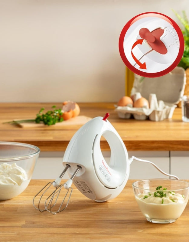 Moulinex Easy Max 200W kneader mixer resting on a kitchen counter with eggs and bowls, featuring rotating beater system.