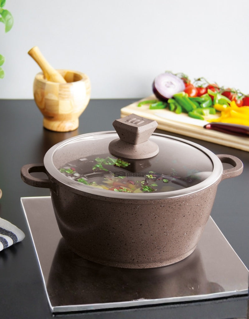 Nea Marbell brown stockpot cooking on stove – heat-resistant non-stick pot with glass lid