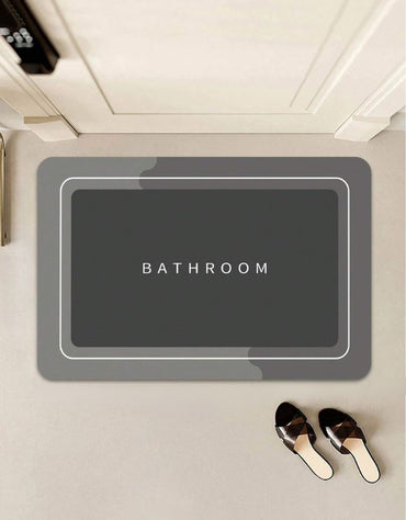 Washable bathroom rug with anti-skid rubber sole.
