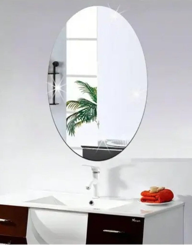 Oval bathroom wall mirror above vanity sink with modern design