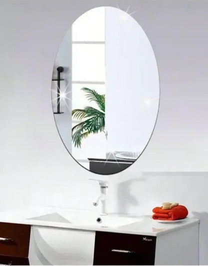 Oval bathroom wall mirror above vanity sink with modern design