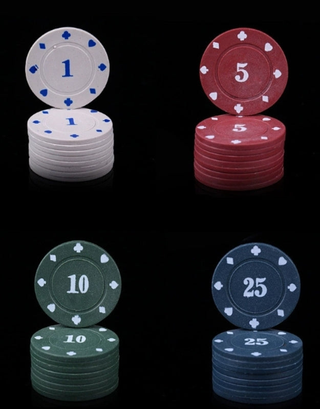  A detailed view of four stacks of different colored poker chips from the set, showing their values of 1, 5, 10, and 25 on a black background