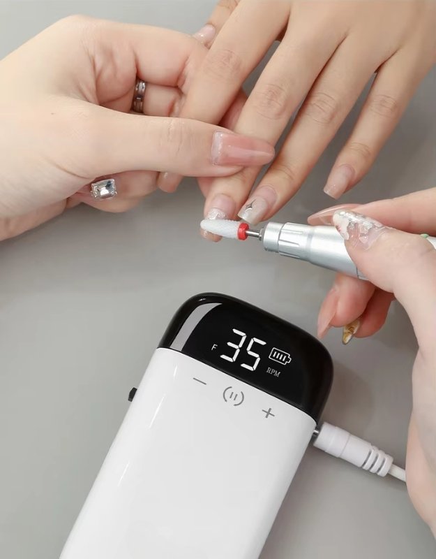 Professional nail drill machine used for manicure nail filing.