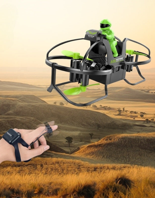 Quadcopter drone flying outdoors with green propellers and touch control hand remote