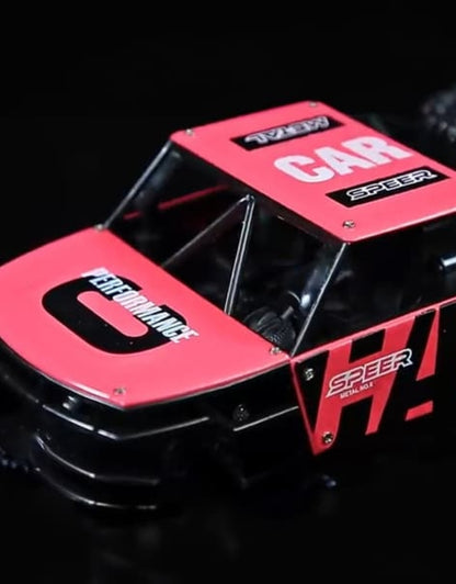 Close-up of the red metal body design of the remote control monster truck