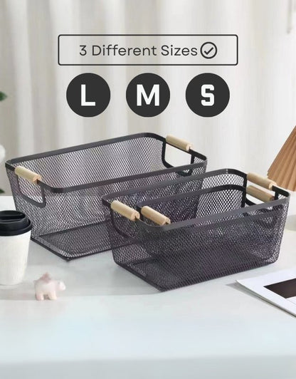 Set of three rectangular black mesh baskets with wooden handles in small, medium, and large sizes.