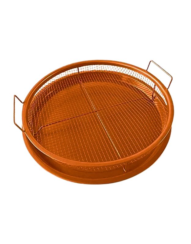 Empty copper-colored round air fryer basket with mesh tray and side handles.
