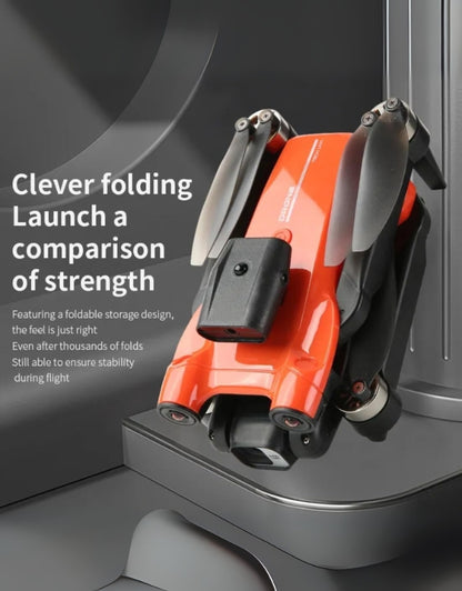 Foldable design of S163max mini drone in orange for compact storage.