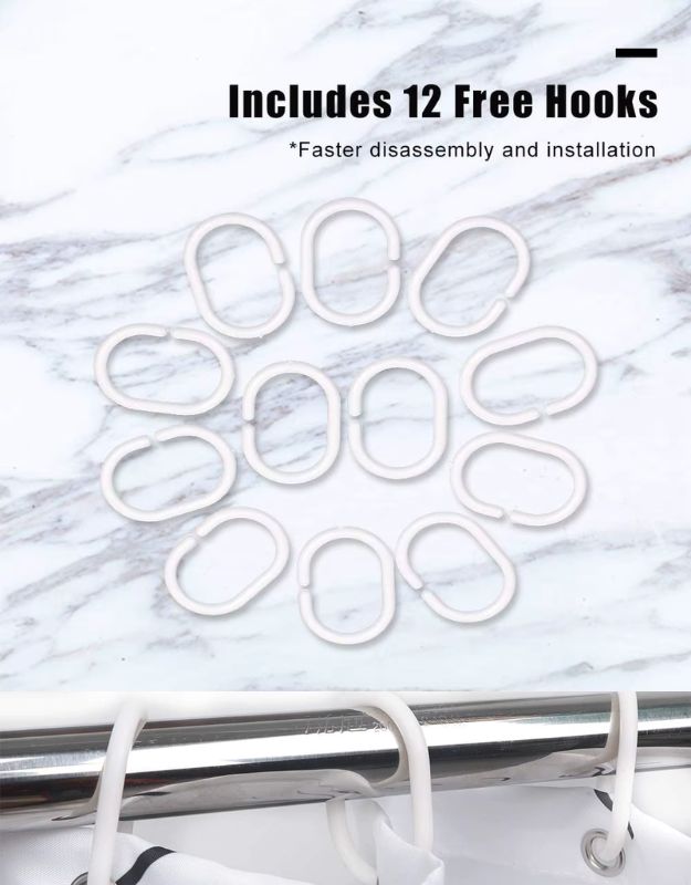 Set of 12 white plastic shower curtain hooks on marble surface.
