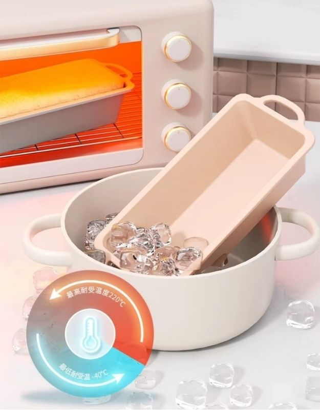 Small oven with a container of ice cubes and a temperature gauge on a kitchen counter. Heat-resistant silicone loaf pan used in oven and freezer with ice.