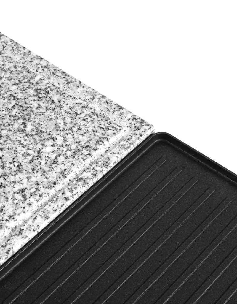 Close-up of granite stone and nonstick grill plates of Silver Crest raclette grill