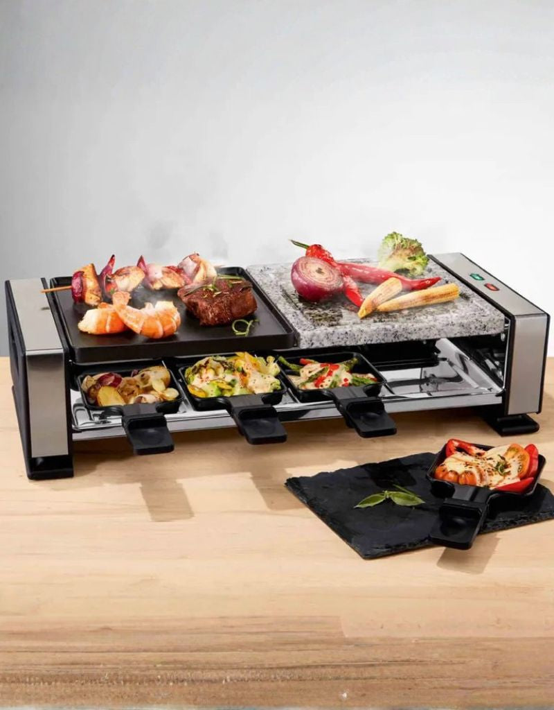 Silver Crest Raclette Grill 1400W serving assorted grilled shrimp, meat, and vegetables in mini raclette trays