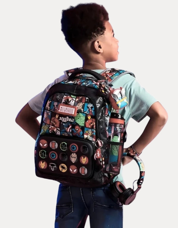 Child wearing Smiggle 15-inch Marvel Super Hero school backpack with Avengers character prints.