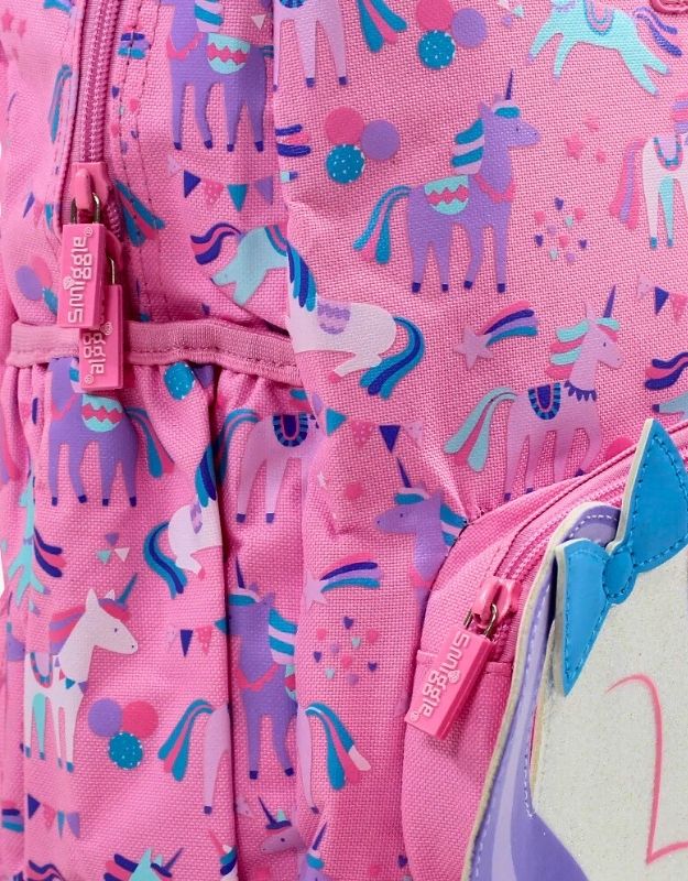 Close up of Smiggle pink unicorn hoodie backpack fabric and zippers