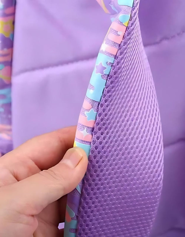 Close-up of side mesh pocket and detailing on Smiggle space cat backpack