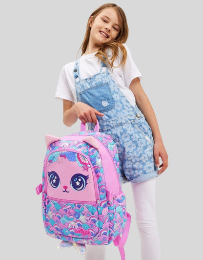 Girl posing with Smiggle 15-inch pink cat face attach school backpack with lunchbox attaches.