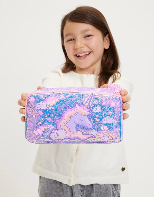 Smiling girl holding Smiggle Unicorn pocket pencil case with pastel unicorn artwork