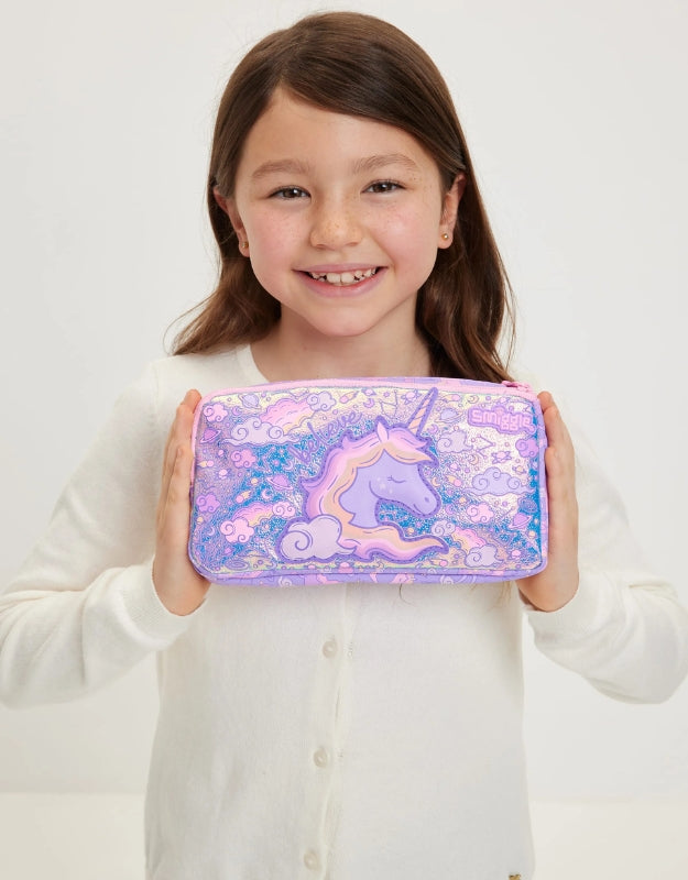Girl holding Smiggle Unicorn pocket pencil case with front-facing view showing full design