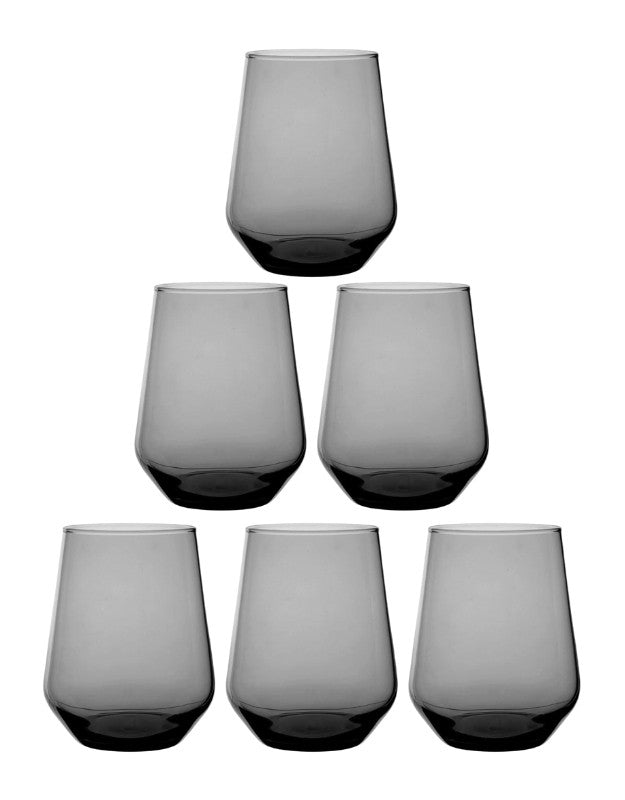 Set of six gray glass tumblers on a white background. Set of six smoky gray drinking glasses with modern design on white background.