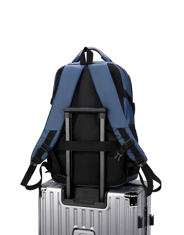 Blue Step On The Brave backpack with travel luggage strap.
