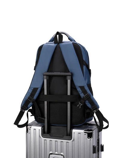 Blue Step On The Brave backpack with travel luggage strap.