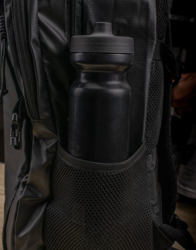 Side mesh bottle pocket of Step On The Brave waterproof backpack.