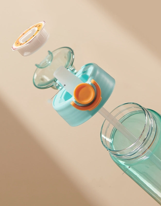 Exploded view of Tritan water bottle lid showing straw, spout, and fruit cartridge.