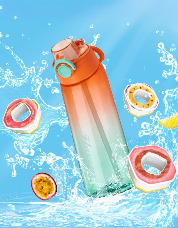 Orange and green Tritan water bottle splashing in water with floating fruit-themed cartridges.