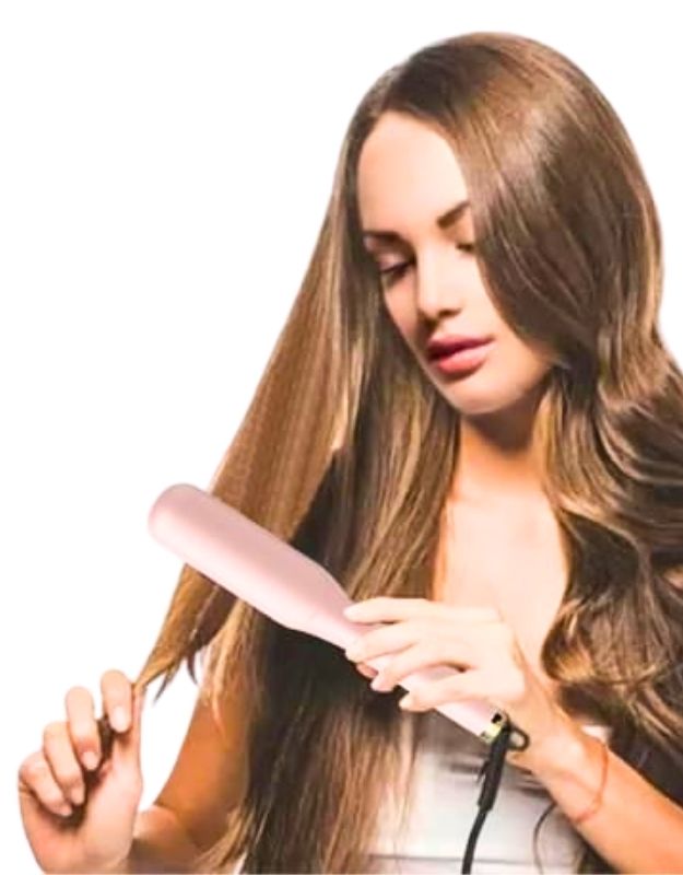 Woman using VGR V-592 hair straightening brush comb for women 59W to style long hair.