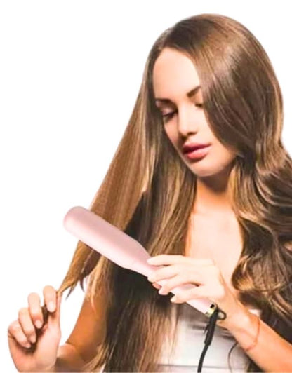 Woman using VGR V-592 hair straightening brush comb for women 59W to style long hair.