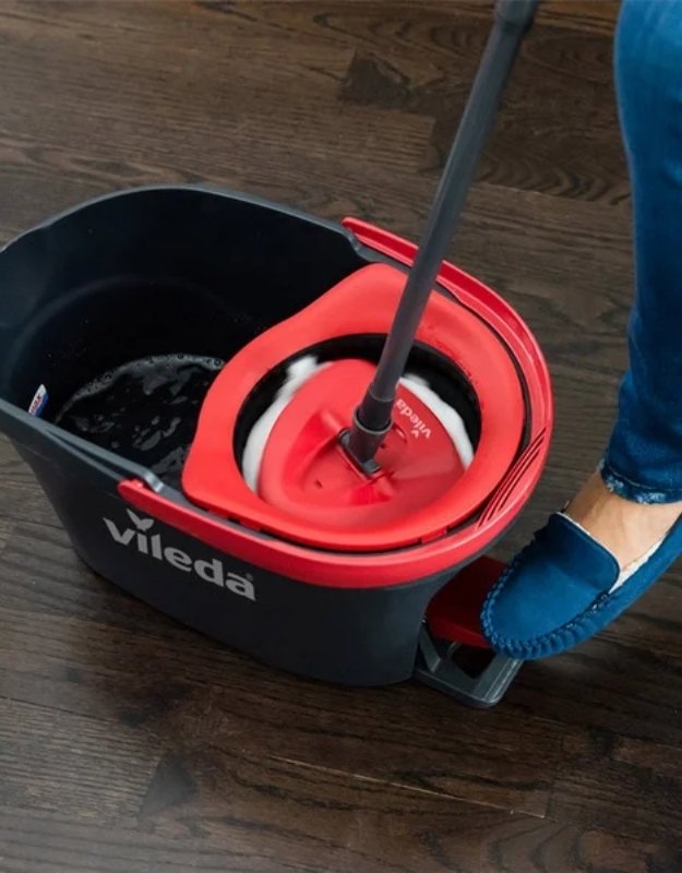 Vileda Turbo spin mop wringing system with foot pedal action.