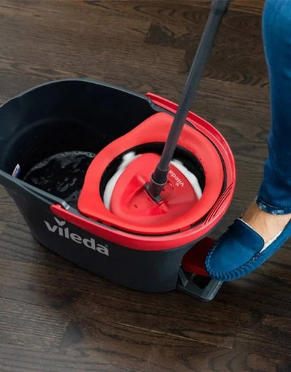 Vileda Turbo spin mop wringing system with foot pedal action.